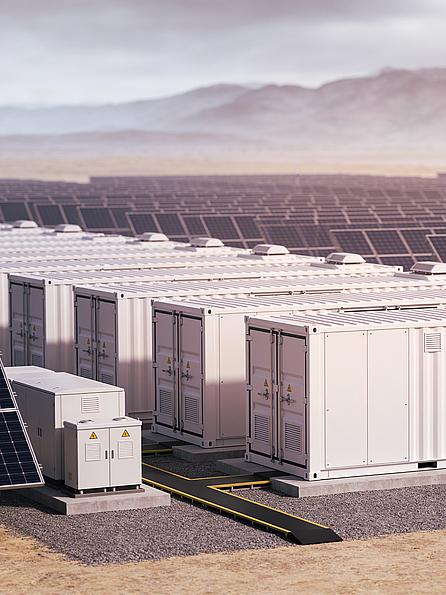 Large scale battery energy storage system with solar panels in a desert landscape